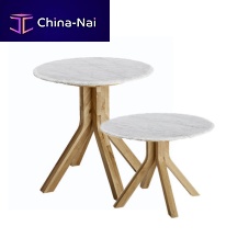 Contemporary side table STONECRUMBoakmarbleround