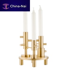 Brass candle holder by Jaime Hayon