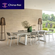 Contemporary table RANCHOaluminumceramicwaxed concrete