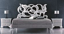 Double bed MEGANoriginal designupholsteredwith headboard