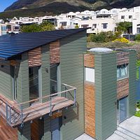 Zinc roofing elZinc RAINBOW® GREENpitchedroundedmetal look