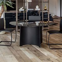 Contemporary table Butterflyglasssheet metal baseleather base