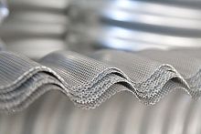 Curved metal sheet corrugatedperforatedsteel