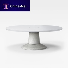 Contemporary table COLOSSUSlaminateconcrete baseround