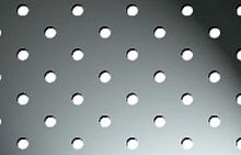 Perforated sheet metal aluminumfor facade claddingwith round perforations