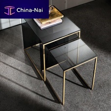 Contemporary nesting tables NIDOcurved glasslacquered glasschromed metal base