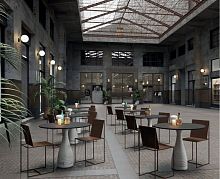 Contemporary table PORCIN'OFFsheet steelconcrete baseround