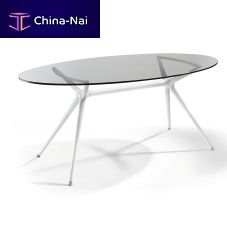Contemporary table METROtempered glasspainted steel baseoval