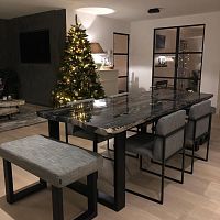 Contemporary coffee table PETRIFIED WOOD AND CHASSISpetrified woodiron baseoval